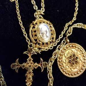 Tiered golden chain necklace with 3 pendants
